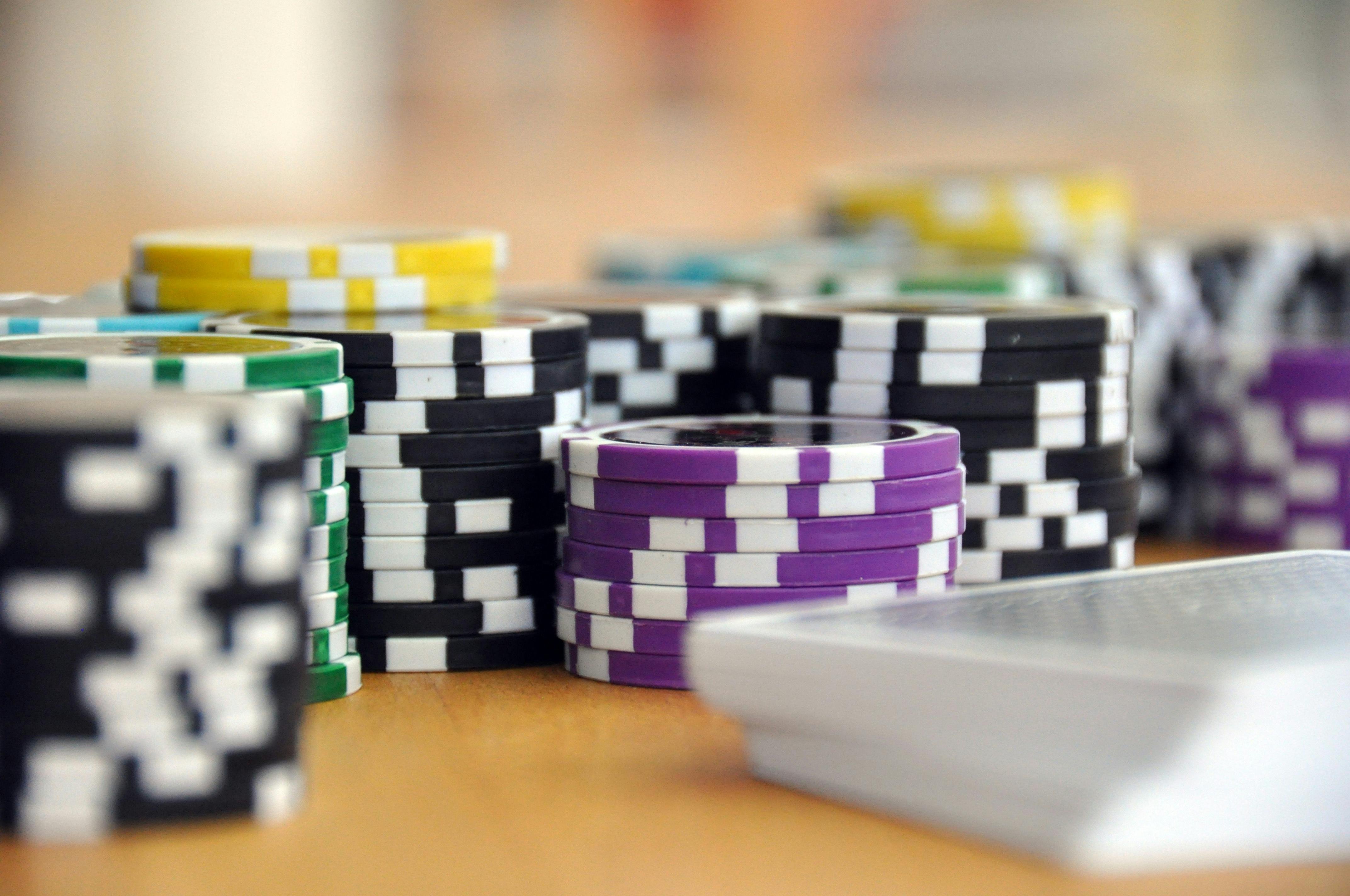 Player reviewing casino-style game categories and account notes on phone
